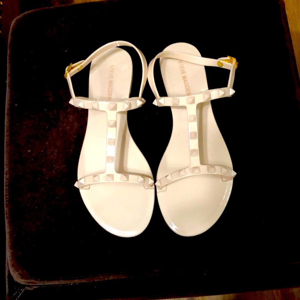 Steve Madden jelly sandals.